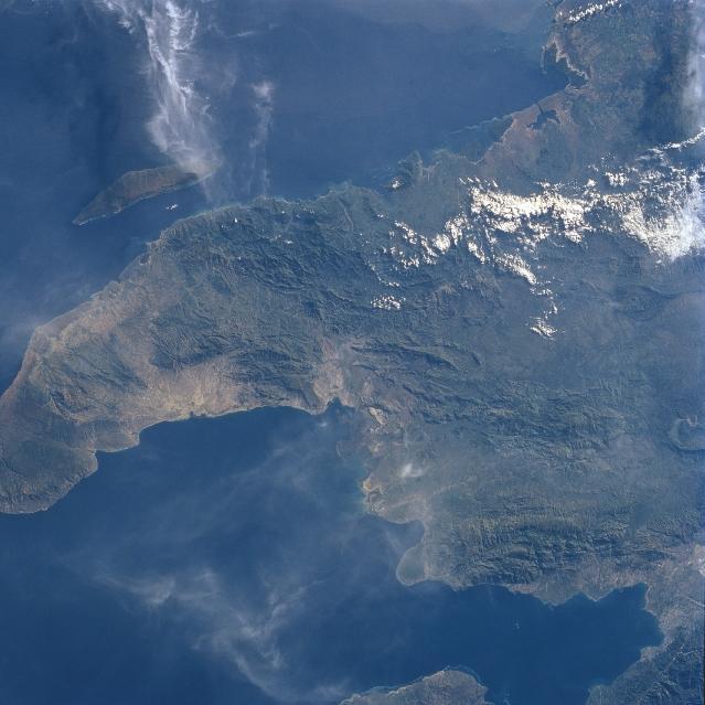 The northwest peninsula of Haiti and the Gulf of Gonave are visible in this northeast-looking view. The Gulf of Gonave is situated in the pincers of two mountainous peninsulas and is considered one of the most beautiful in the world. Image courtesy of NASA.
