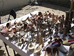 Shoes, sculptures, and goblets