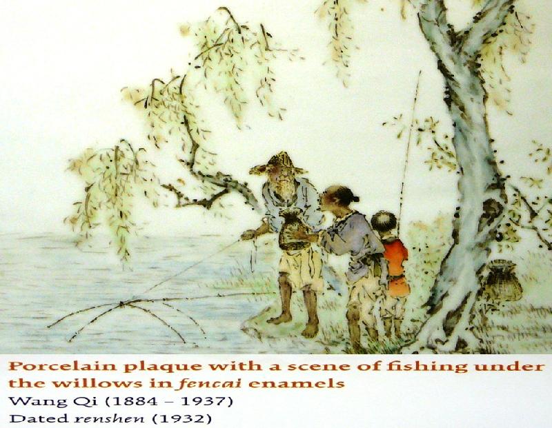 porcelain plaque showing fishing people under a tree