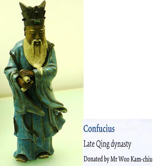 figurine showing Confucius