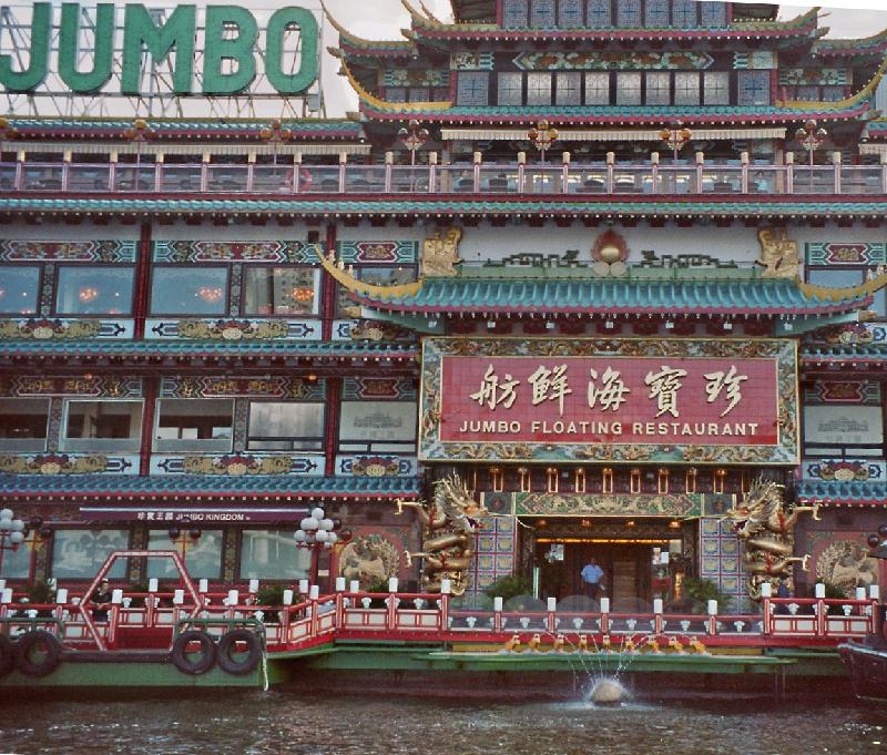 decor of the floating restaurant in green and red