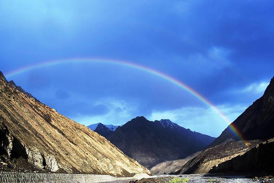 Rainbow covers the mountains