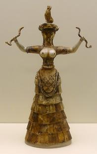 Kleine Schlangengöttin aus Fayence aus der Schatzkammer des Heiligtums of Knossos Kleine Schlangengöttin aus Fayence aus der Schatzkammer des Heiligtums of Knossos