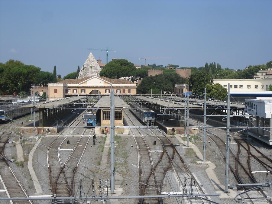 Railway station with pyramid in the background