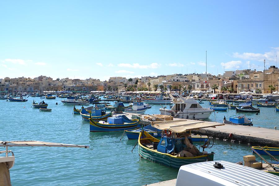 Traditional fishing boots, called Luzzus, in Marsaxlokk harbour.